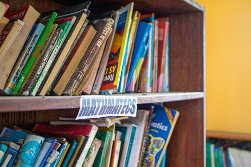 a book shelf filled with lots of books